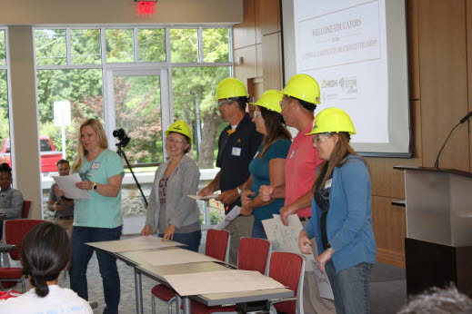 Teachers shared their plans for bringing the STEM career message to the classrooms in lighthearted group presentations.